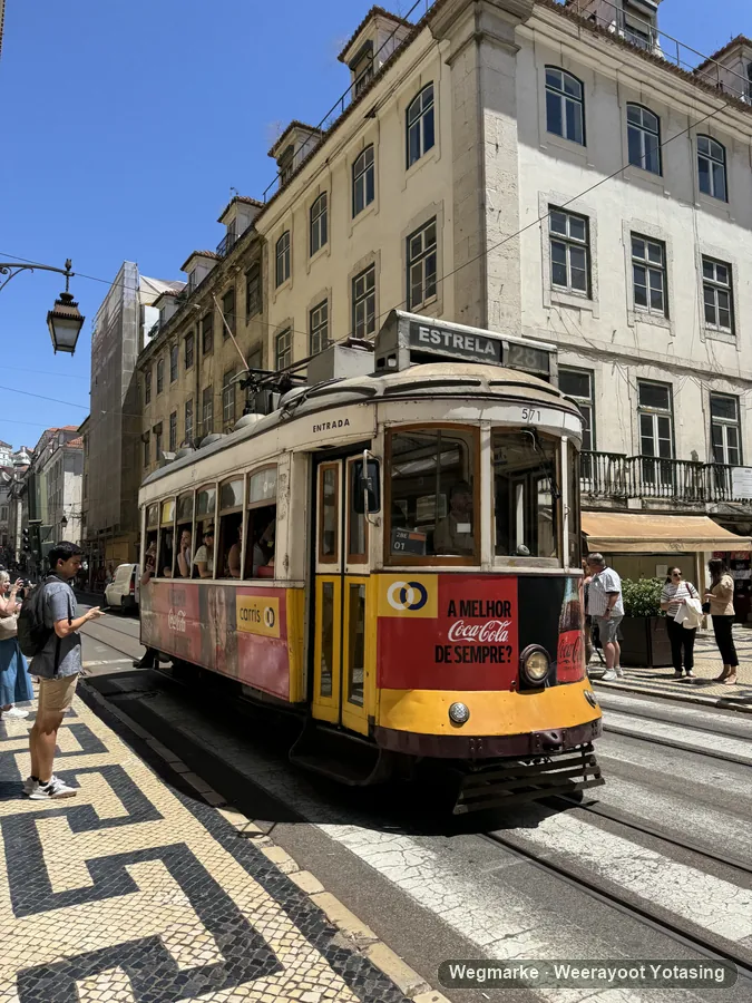 A tram rounding a city corner